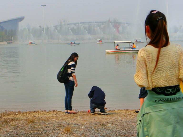 My student was getting instructions from a stranger on how to properly skip a stone on water.