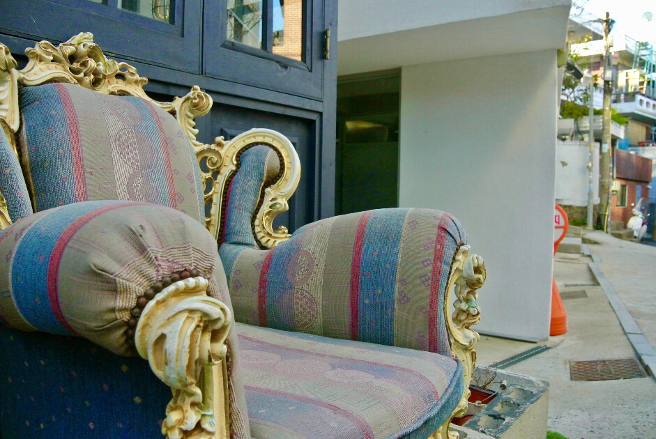 Striped periwinkle, cobalt blue, and burgundy Queen Anne chair: From every perspective, the harmonious interplay of colors and stripes accentuates the classic Queen Anne style.