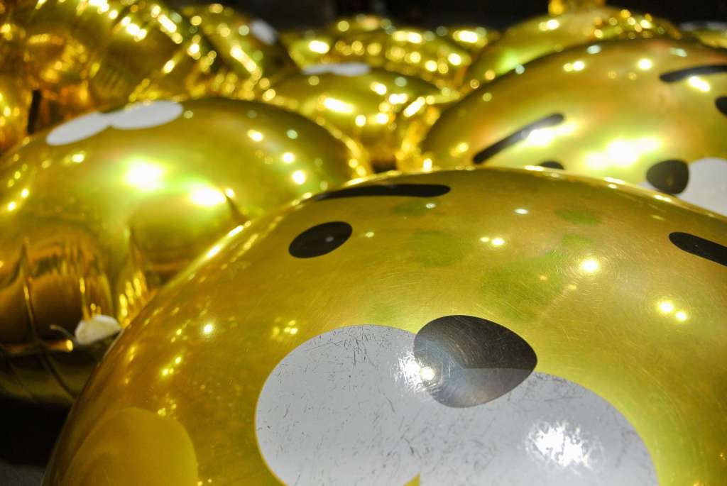 extreme close-up of golden balloons of Ryan bear from Kakao talk.